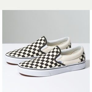 Women’s checkerboard Vans slip on. Worn sparingly.